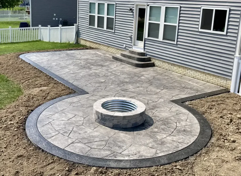 Northland Concrete specializes in luxurious brick patios with outdoor seating, enhancing your garden's appeal.